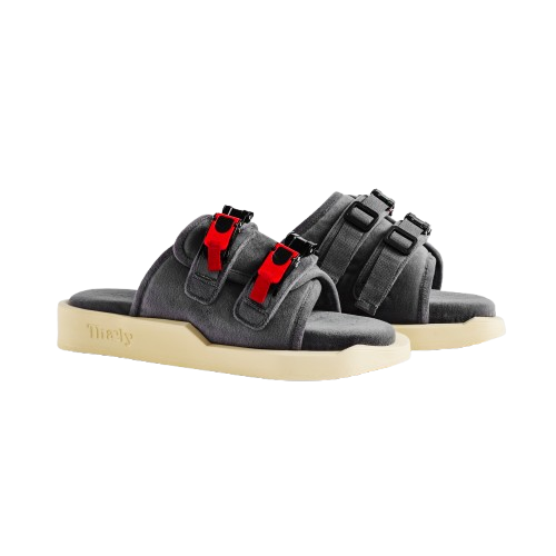 Gray streetwear slide sandals with red buckle straps and cream rubber soles