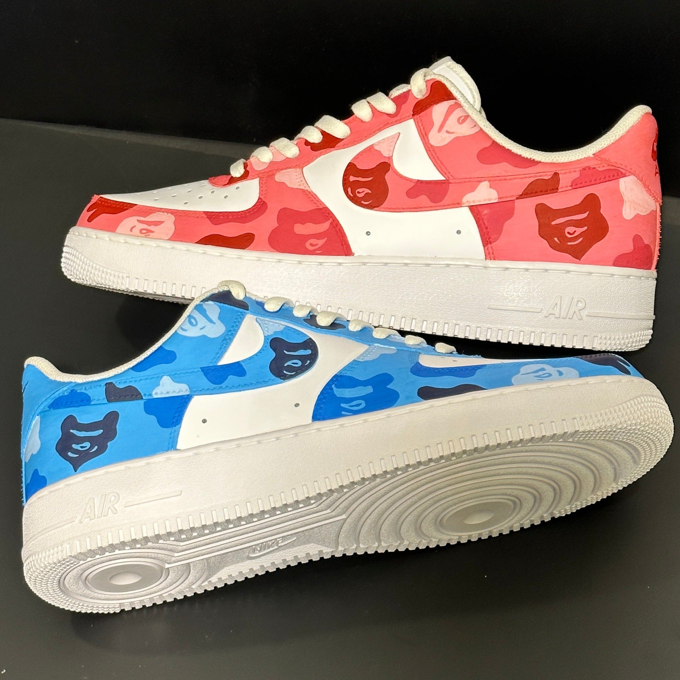 Custom streetwear sneakers with red and blue bear camo print, white soles and Nike swoosh.