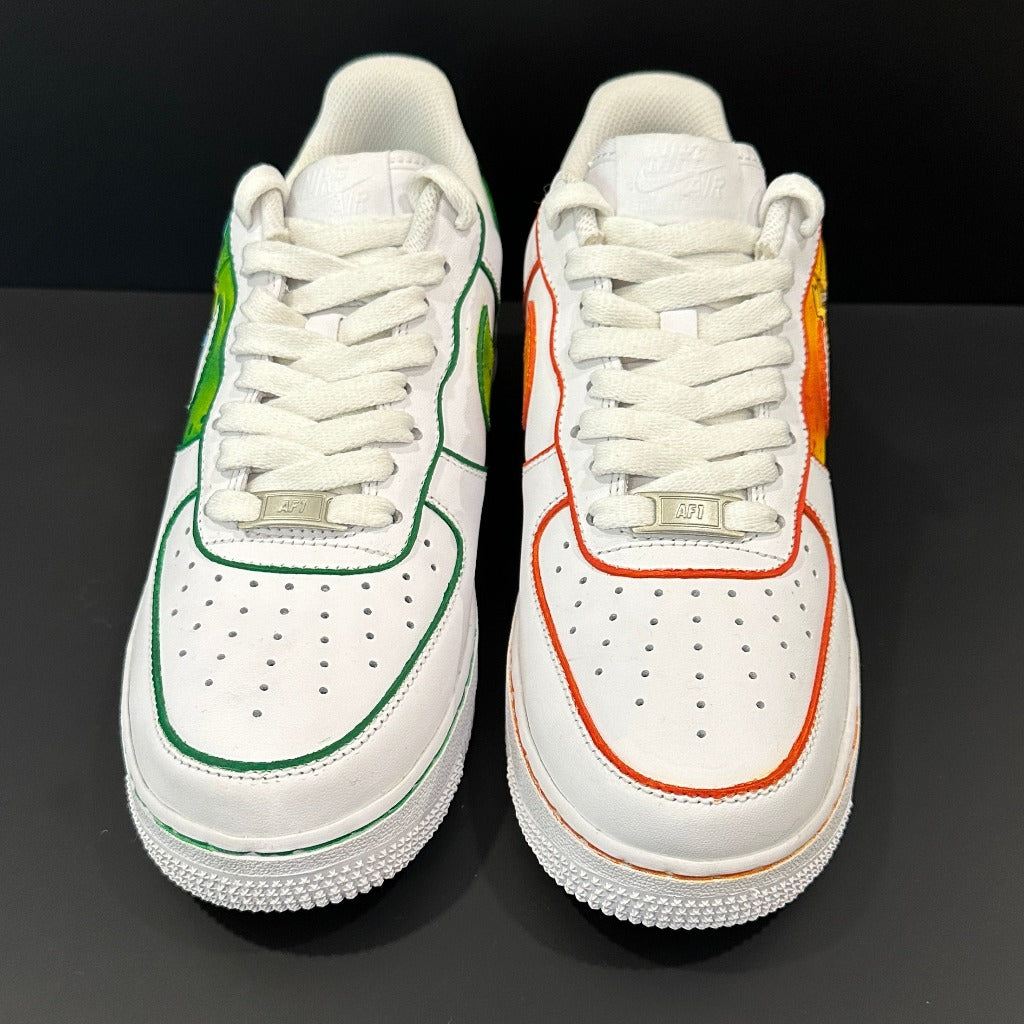 White Nike Air Force 1 sneakers with green and orange stitching, streetwear footwear