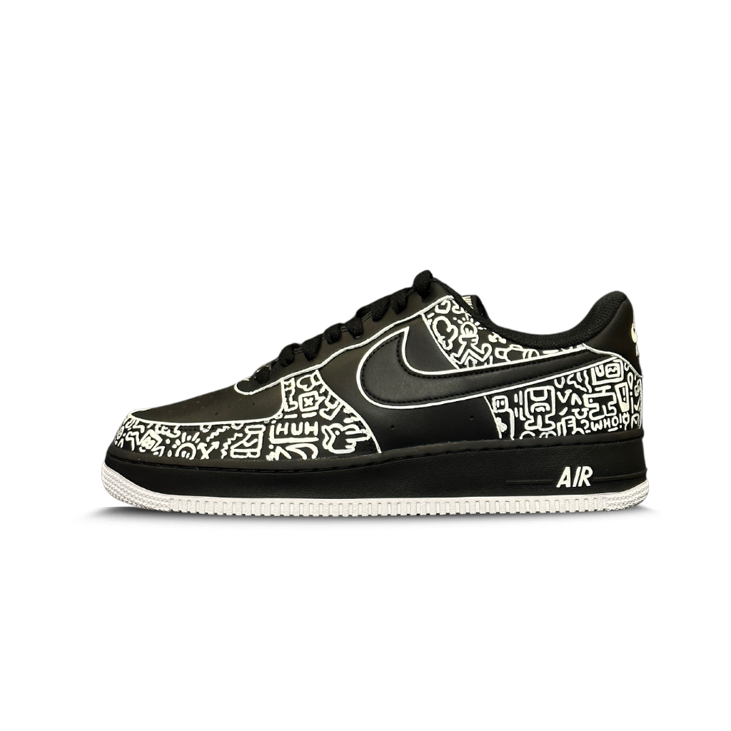 Black and white Nike Air Force 1 sneaker with graphic streetwear doodle design