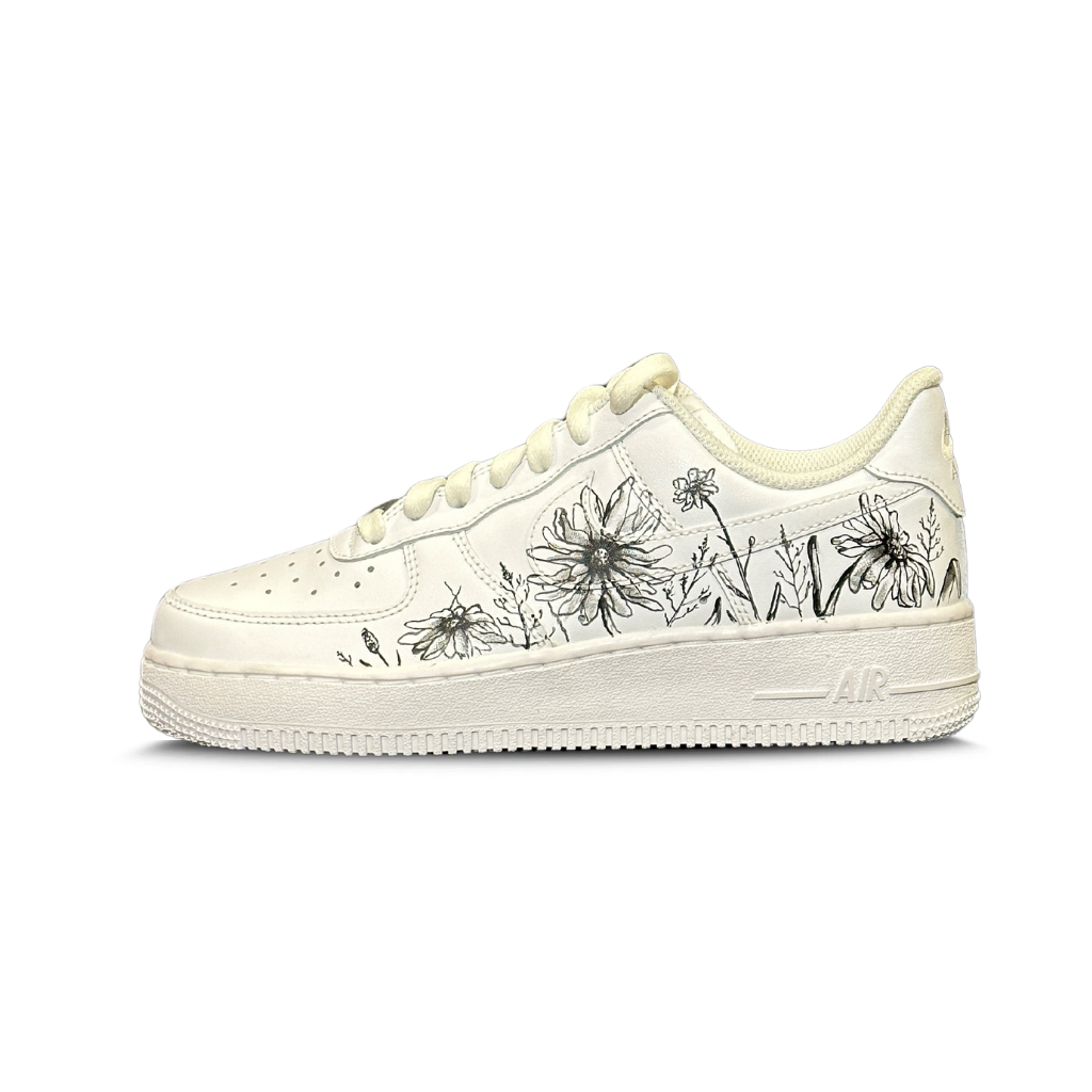 White sneaker with black floral sketches, streetwear low-top luxury footwear
