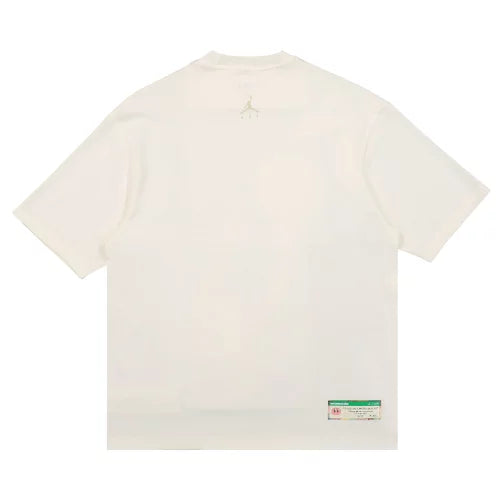 back view of plain white streetwear t-shirt with small tag detail on lower hem