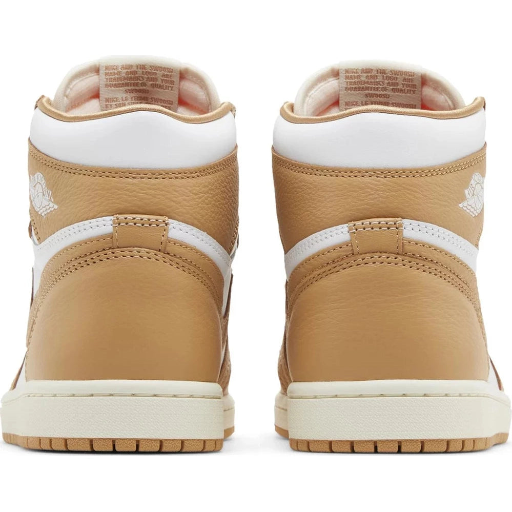 Rear view of tan and white high-top sneakers with textured leather, streetwear style