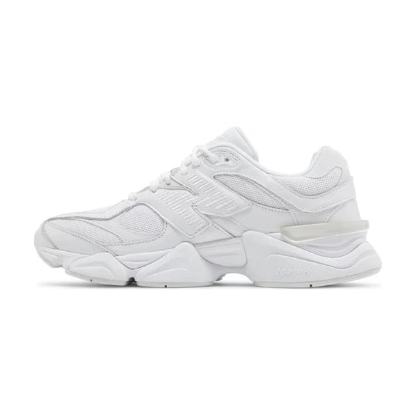All-white chunky mesh and leather sneaker with textured sole, side profile on white background