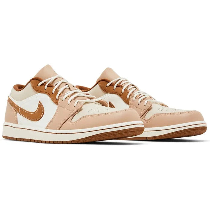 Low-top beige and white sneakers with brown swoosh and gum sole, lace-up streetwear shoes