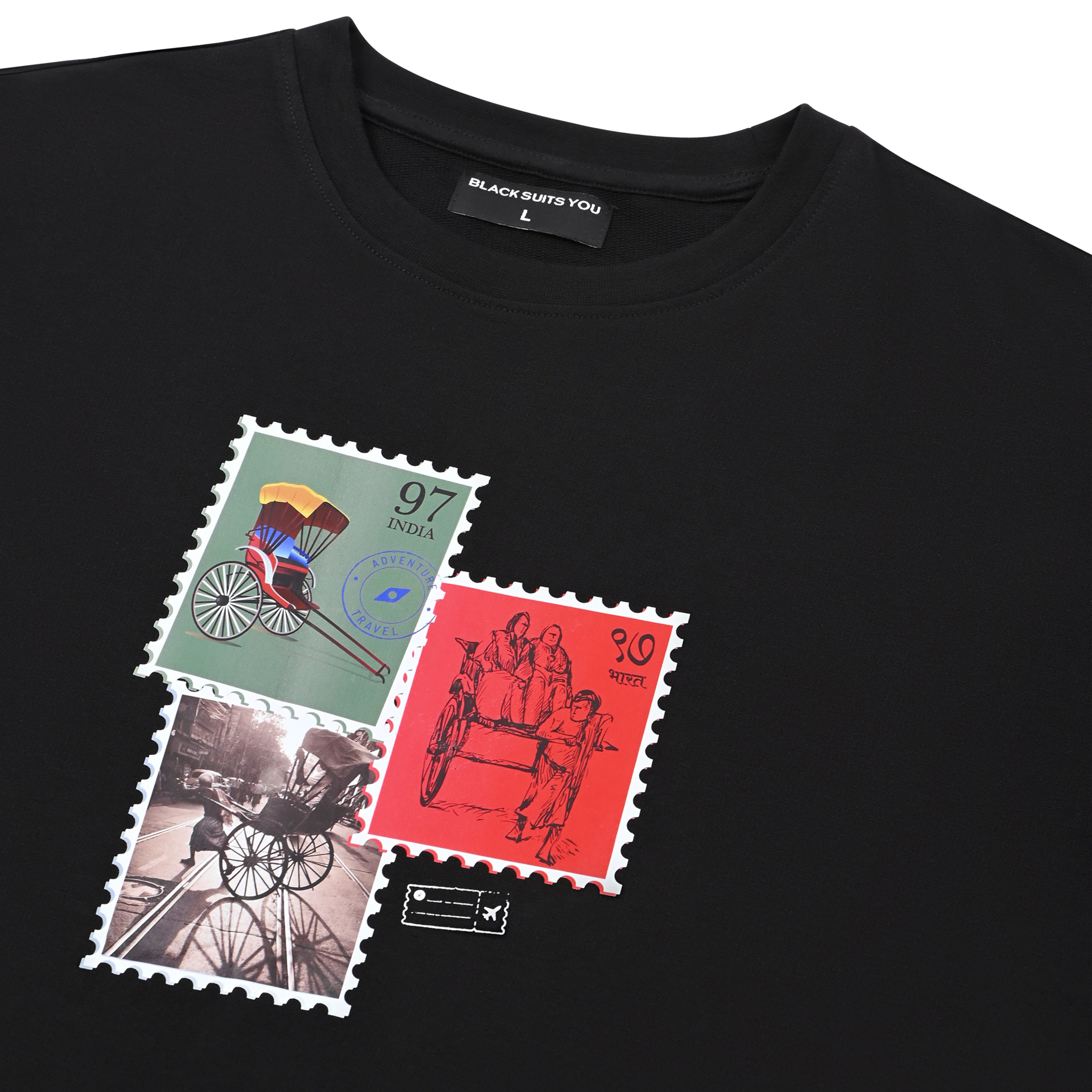 Black streetwear t-shirt with colorful rickshaw stamp graphics and vintage travel design