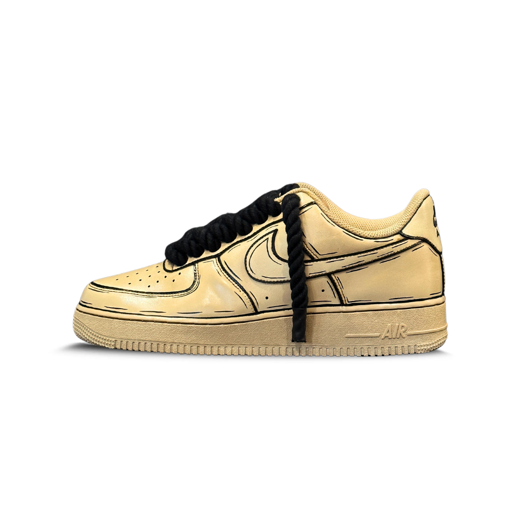 Tan streetwear sneaker with black sketch-like outlines and chunky black laces, side view