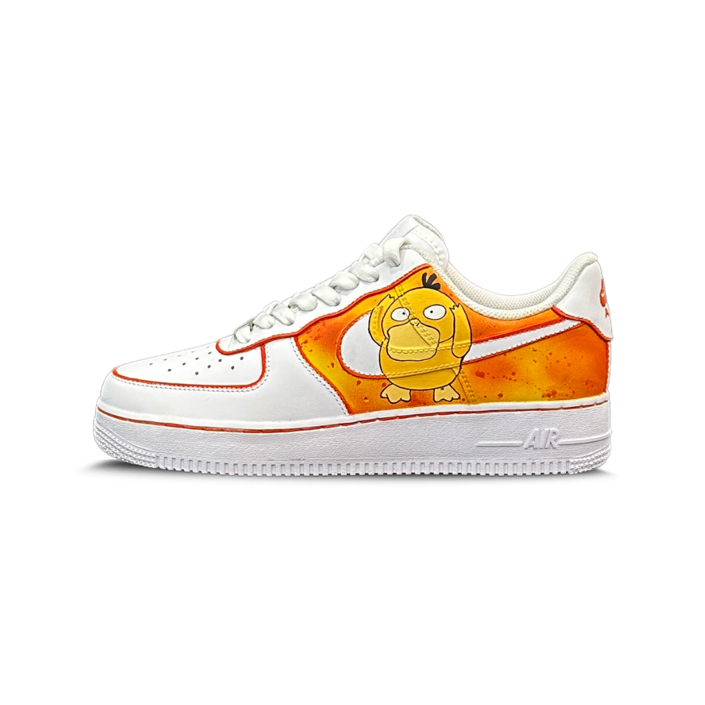 Custom white sneaker with orange accents and cartoon Psyduck graphic, streetwear style