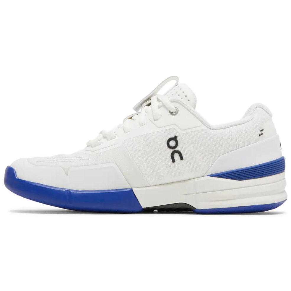 White streetwear sneaker with blue sole and black logo, modern low-top athletic shoe