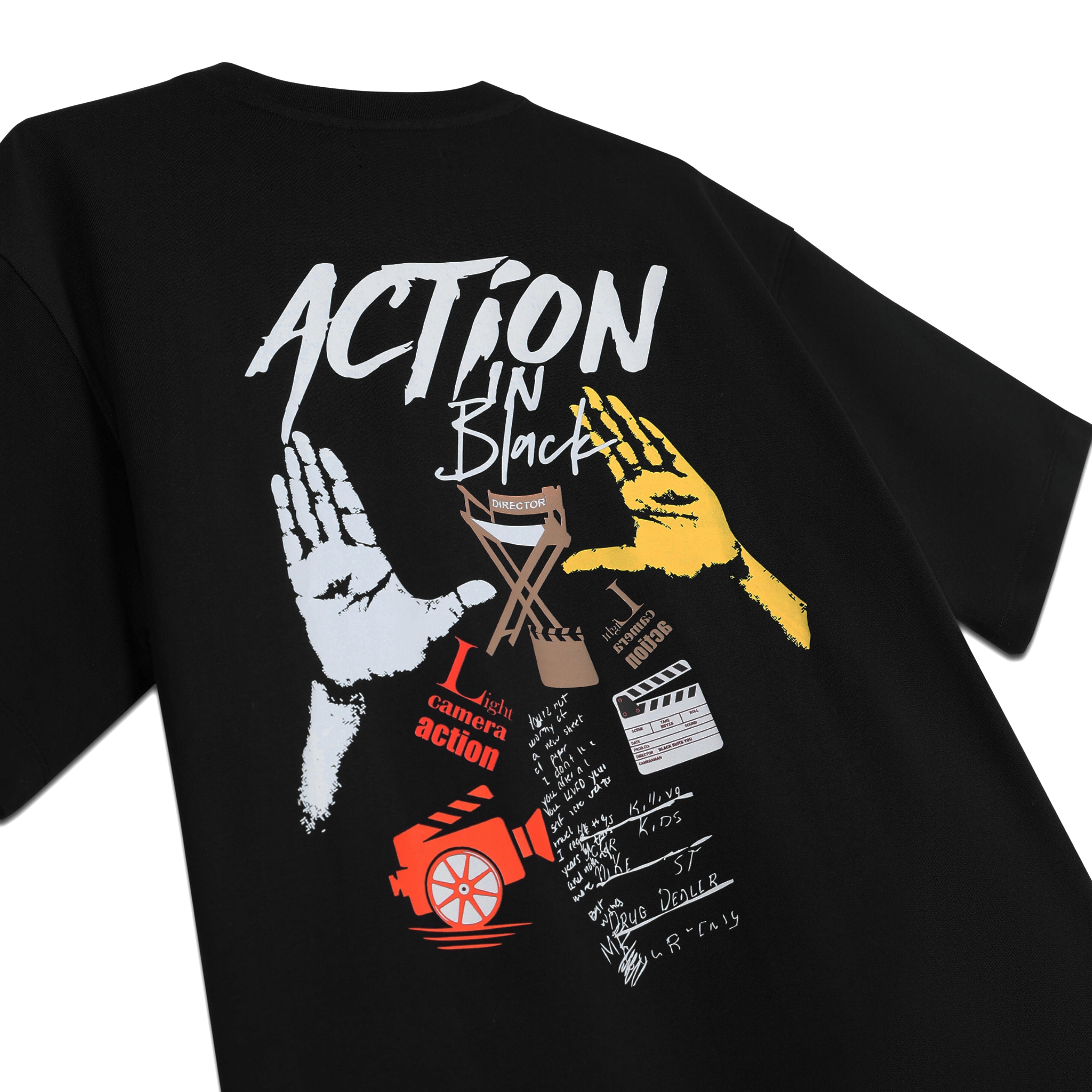 Black streetwear t-shirt featuring bold film-themed graphics, director’s chair, camera, colored hands, and clapperboard