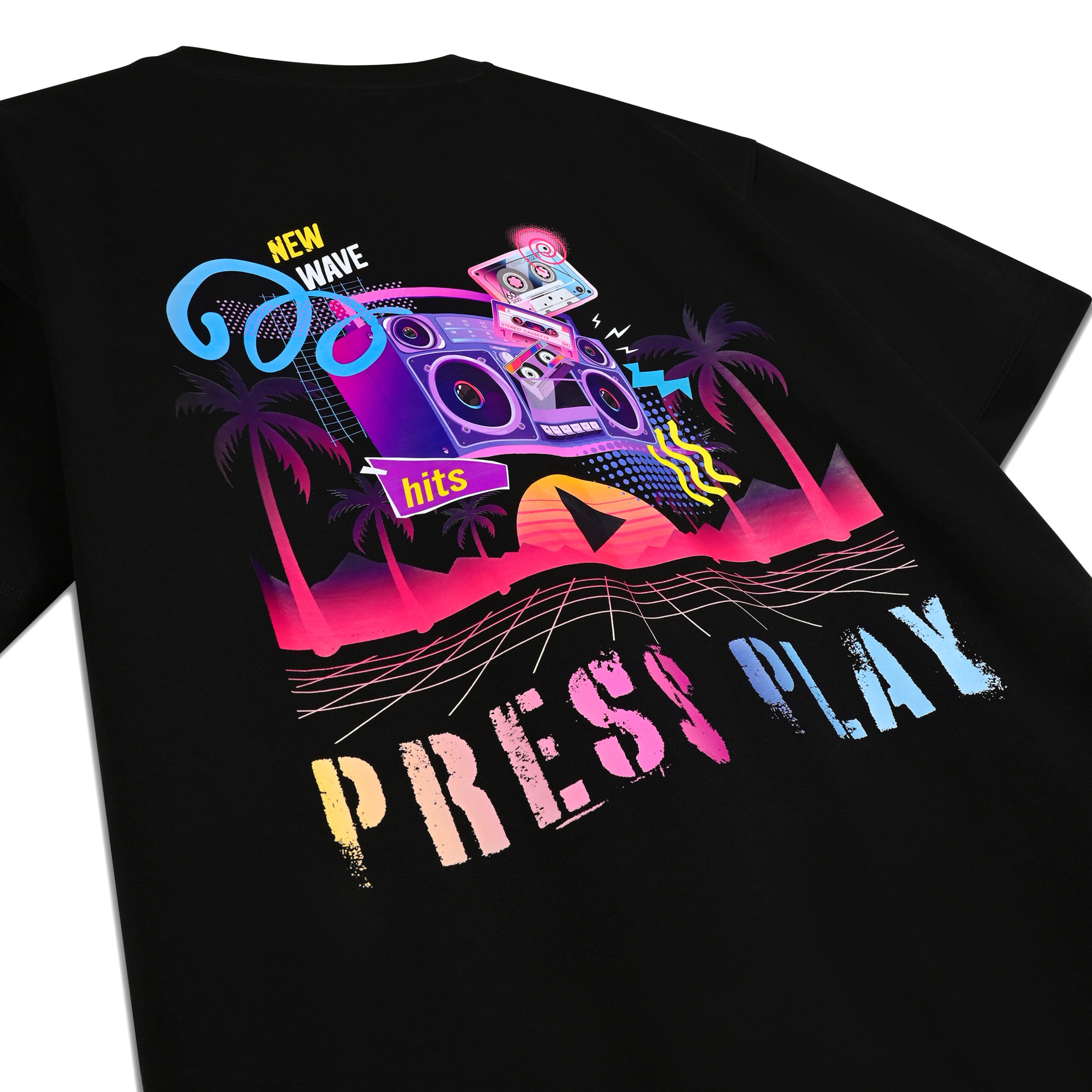 Black streetwear t-shirt with retro boombox, cassette tapes, palm trees, and 'PRESS PLAY' graphic.
