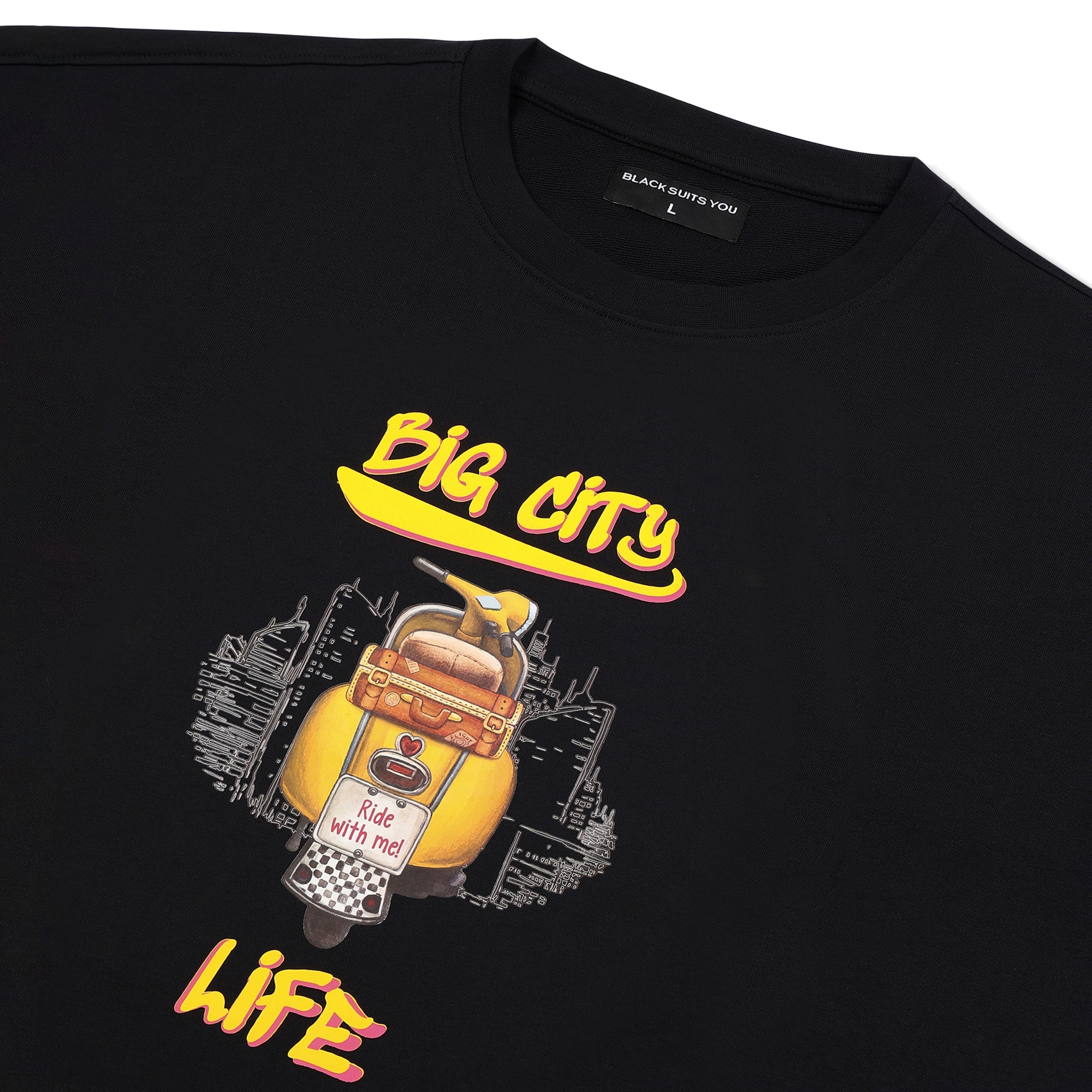 Black streetwear t-shirt with yellow scooter and cityscape graphic, 'Big City Life' print