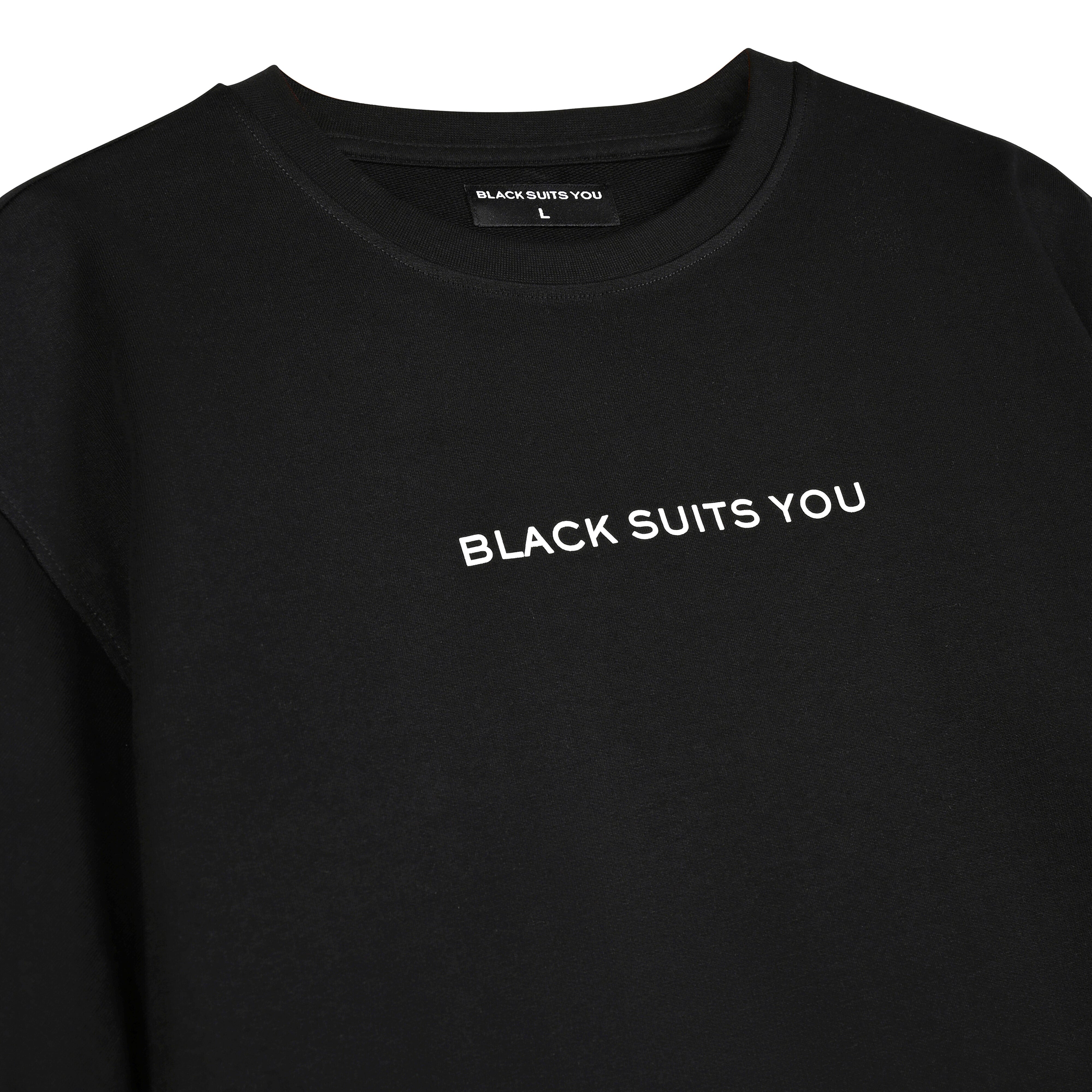 Black streetwear t-shirt with 'BLACK SUITS YOU' white text graphic on chest