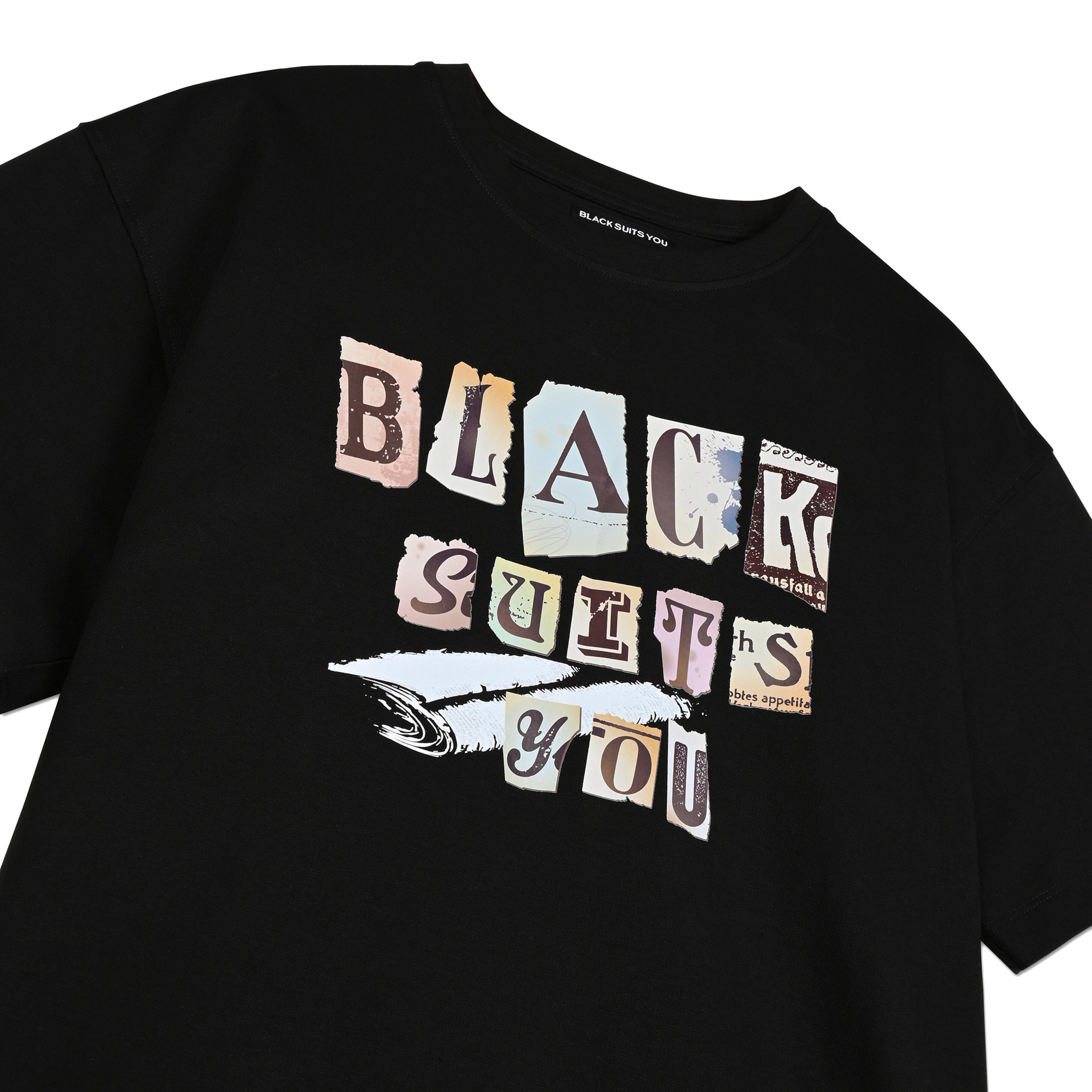 Black streetwear t-shirt with colorful 'Black Suits You' graphic and feather design