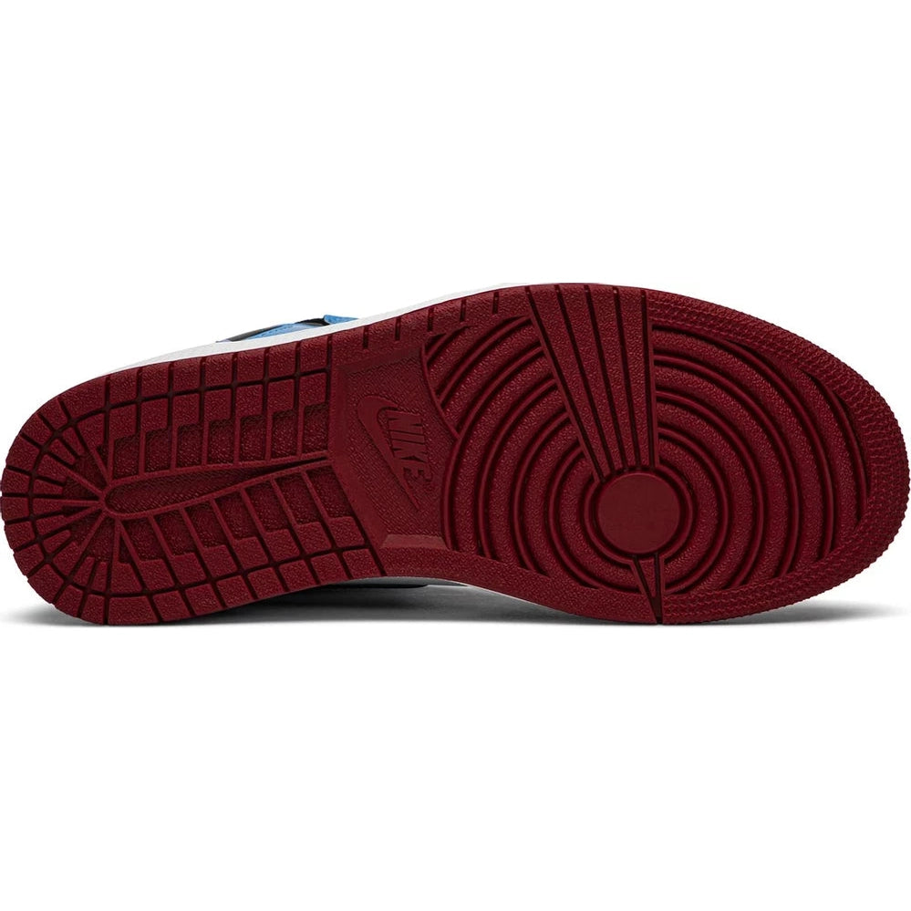 Red outsole of a Nike Air Jordan sneaker, textured tread pattern, streetwear footwear