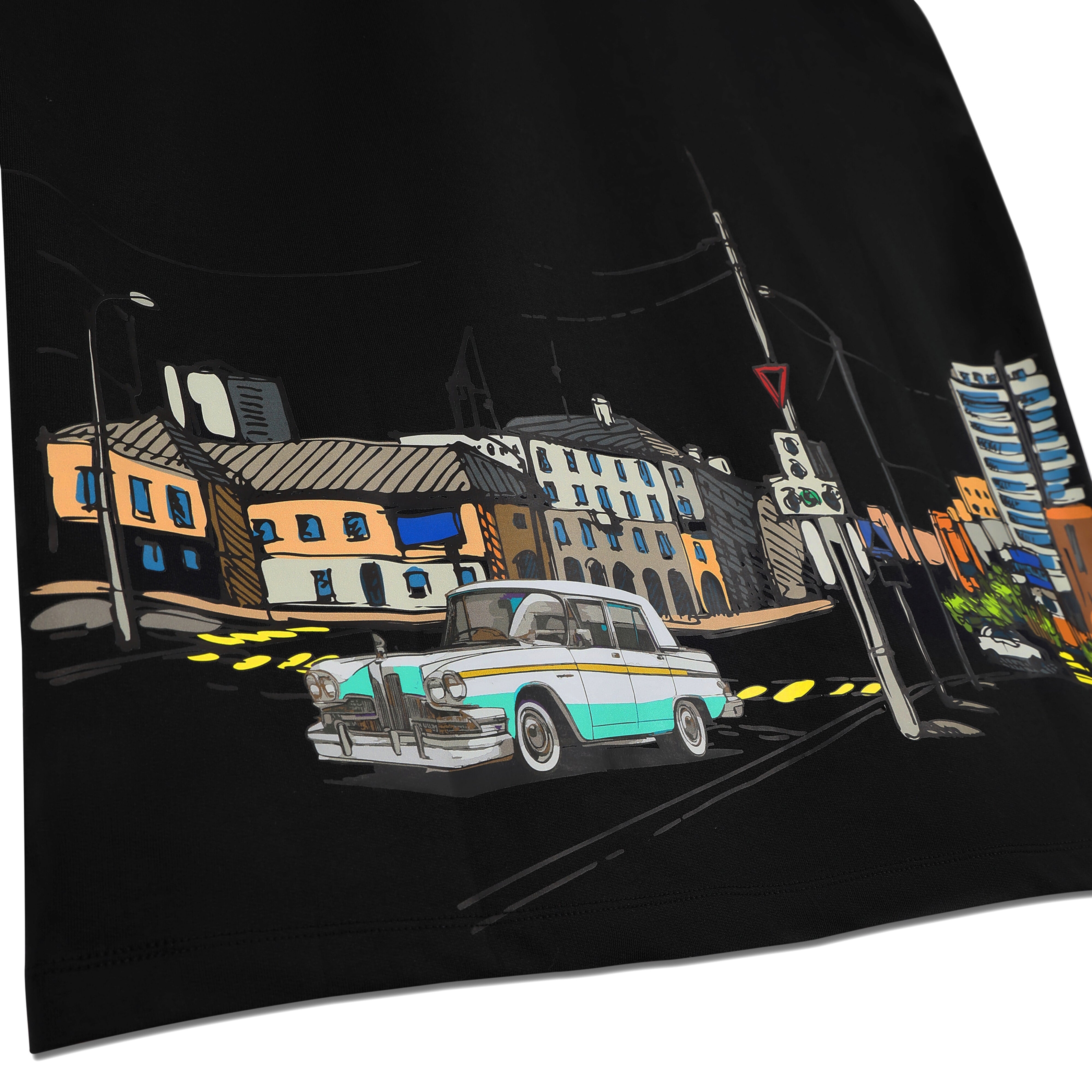 Graphic tee with classic car and colorful city street illustration, streetwear style