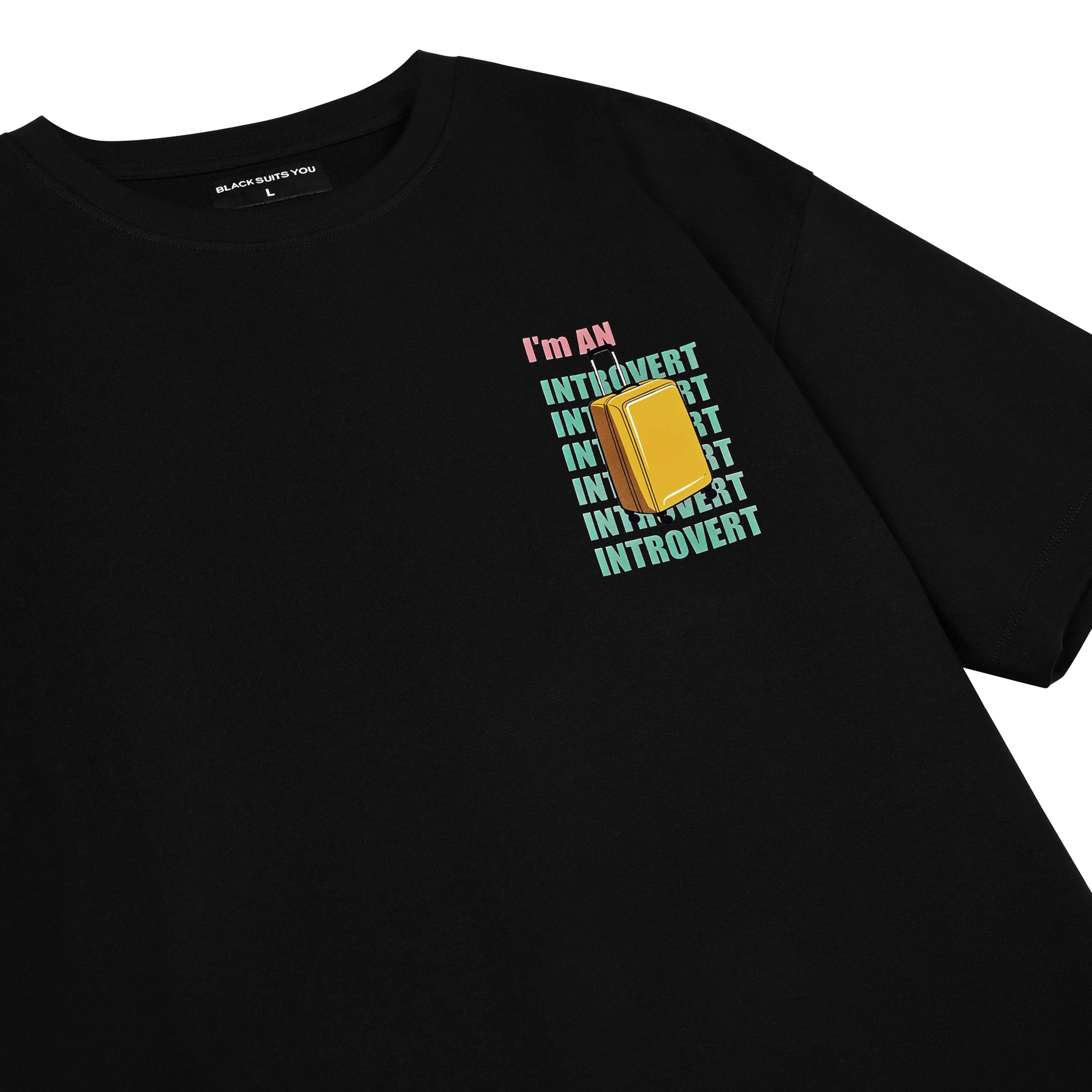 Black streetwear t-shirt with 'I'm an introvert' text and yellow book graphic on chest