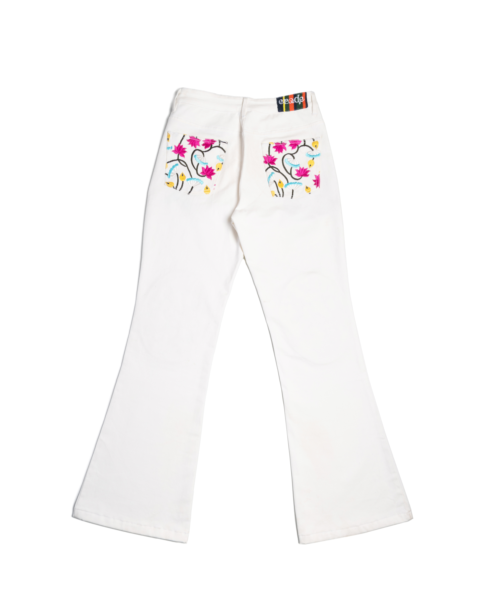 White flared jeans with pink floral embroidery on back pockets, streetwear style