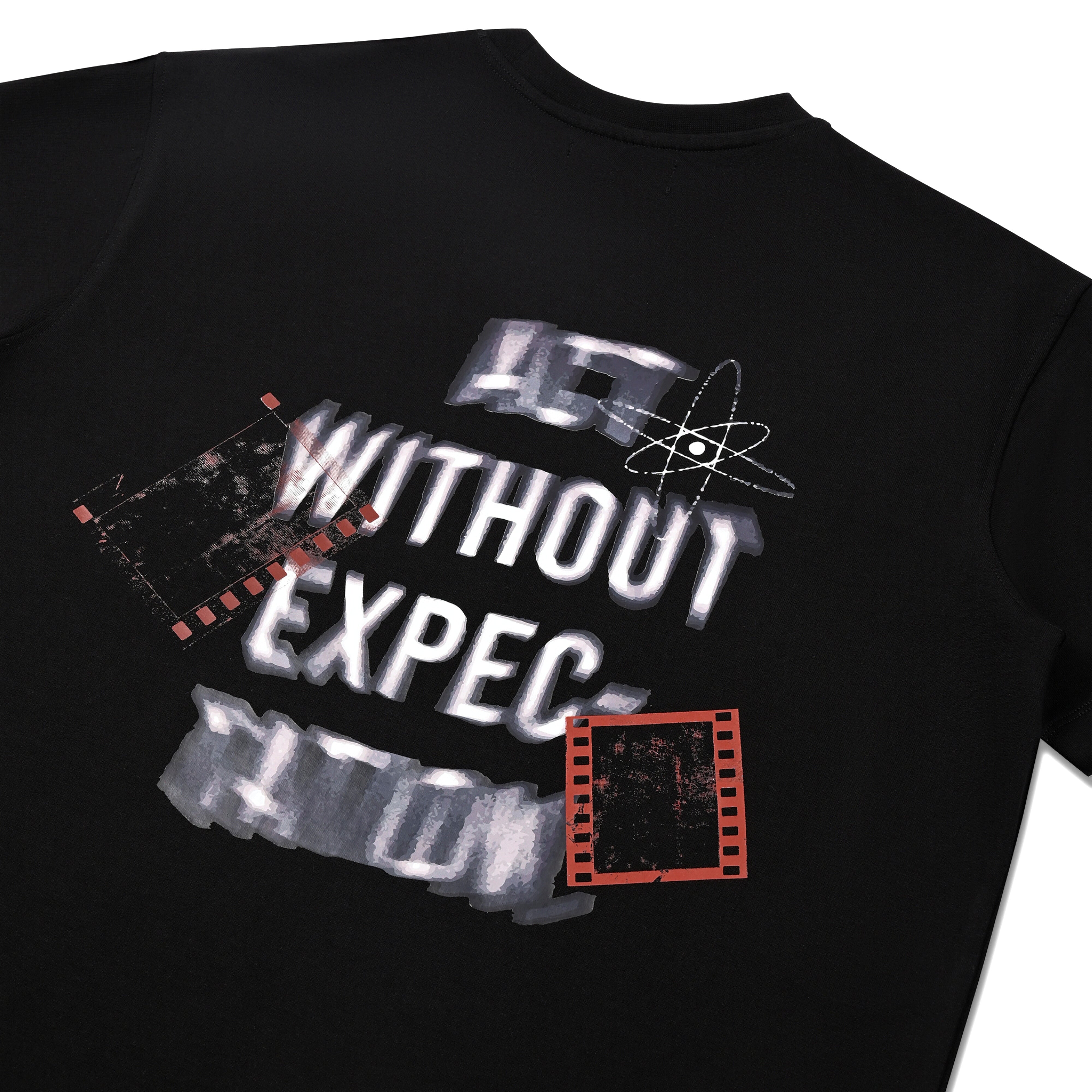 Streetwear black t-shirt with 'Without Expectation' graphic, film strip and atom design