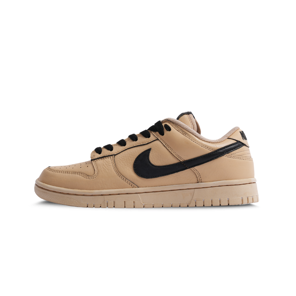 Tan and black leather low-top sneaker with black swoosh, streetwear style