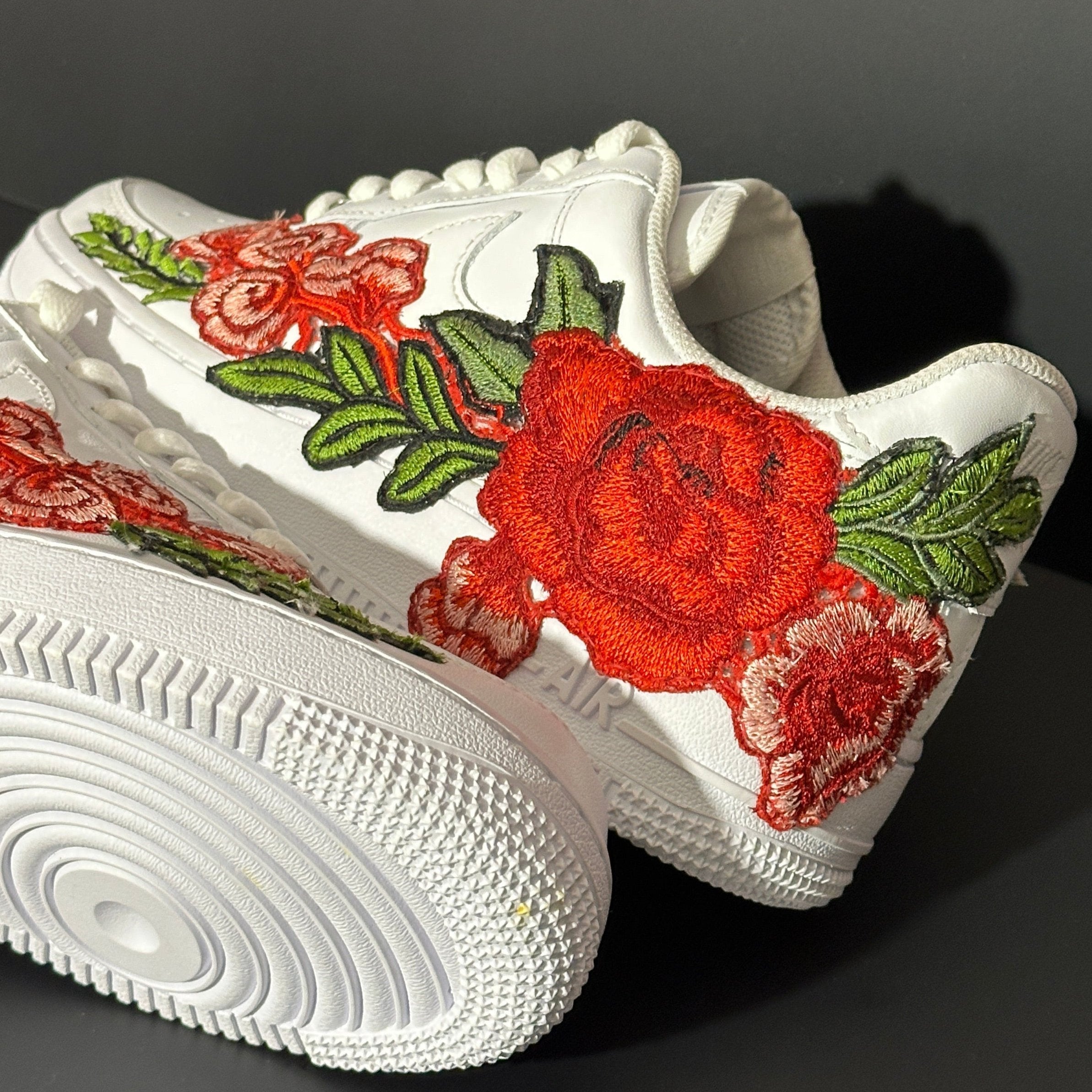 White sneaker with red floral embroidery, luxury streetwear designer footwear