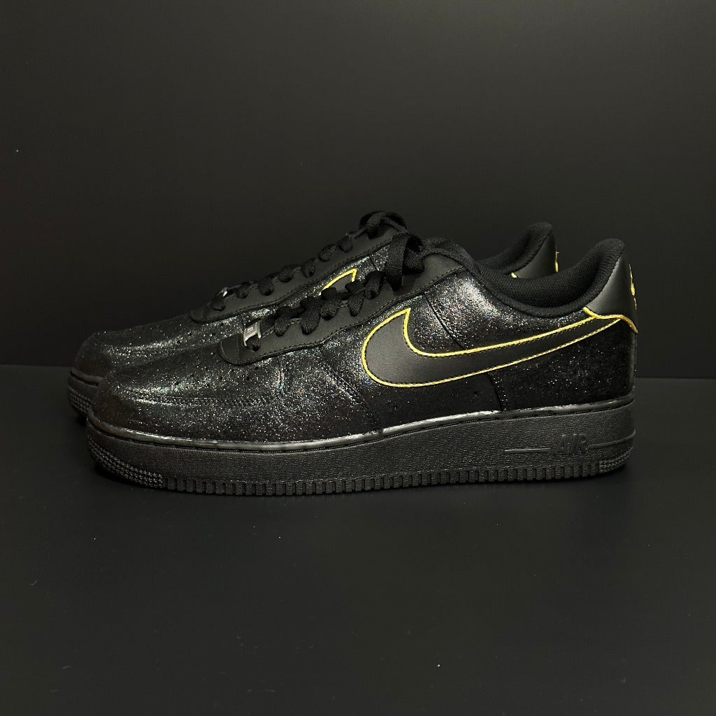 Black Nike Air Force 1 sneakers with yellow outline Swoosh and glitter texture