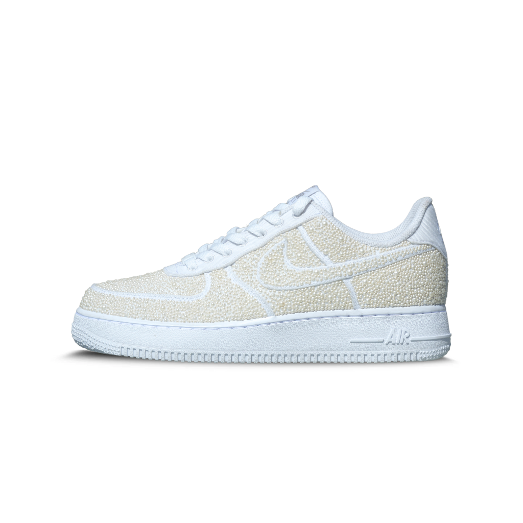 White low-top sneaker with pearl bead detailing on side panels and toe, streetwear shoe