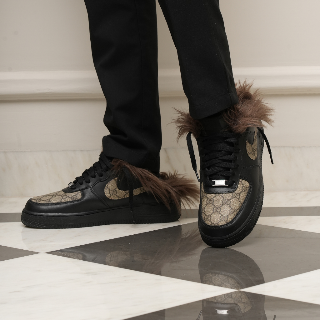 Luxury streetwear sneakers with brown fur trim, monogram panels, and black leather details