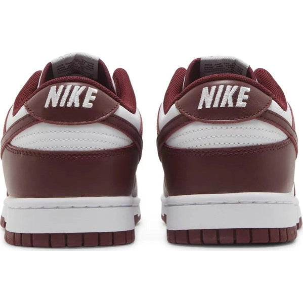 Rear view of red and white Nike sneakers, low-top design, streetwear footwear