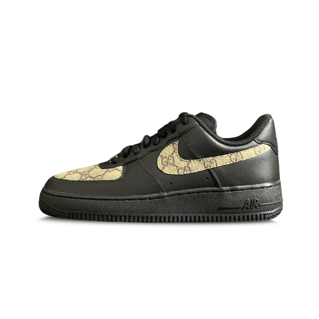 Black streetwear sneaker with gold snakeskin Swoosh and panel accents, side view