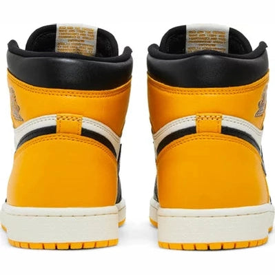 Rear view of yellow and black high-top sneakers with white soles, streetwear style