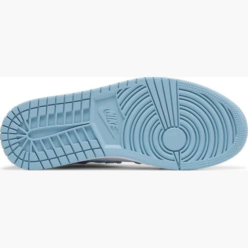 Light blue Nike sneaker outsole with circular traction pattern, streetwear footwear detail