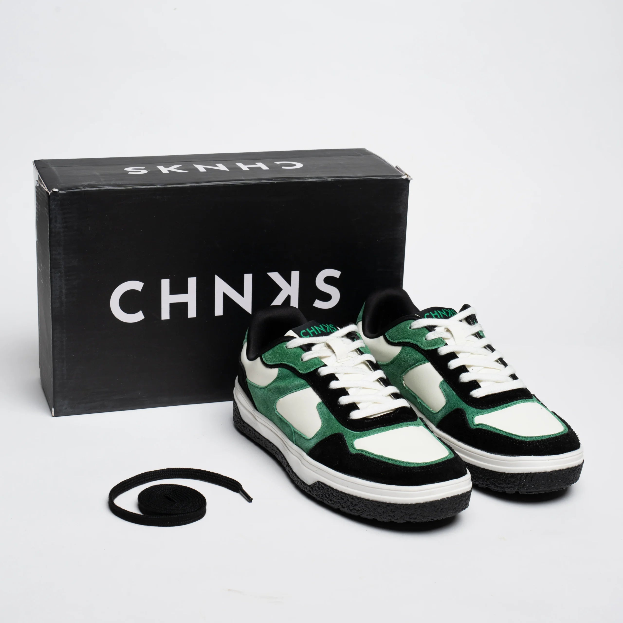 Matrix CHNKS sneakers placed beside box – green sneakers for men with premium packaging