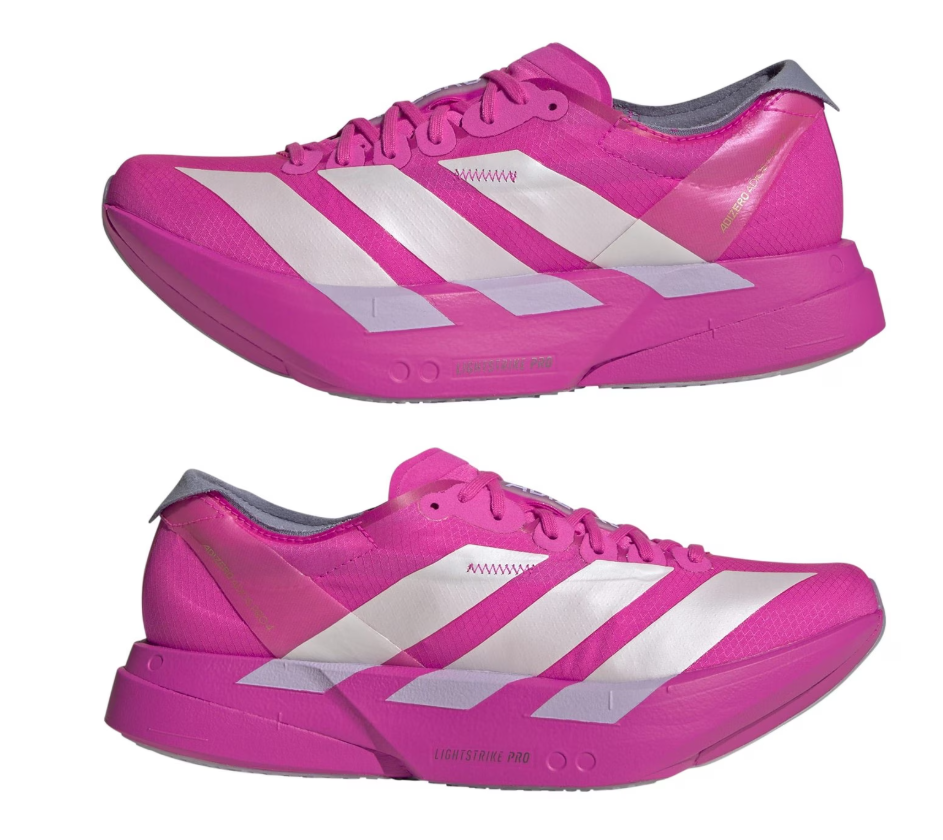 Pink athletic shoes with white stripes on a white background