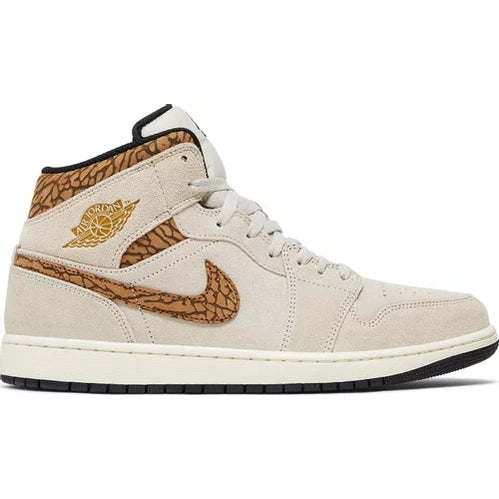 Air Jordan 1 Mid SE sneaker in beige suede with brown elephant print details on side and heel.