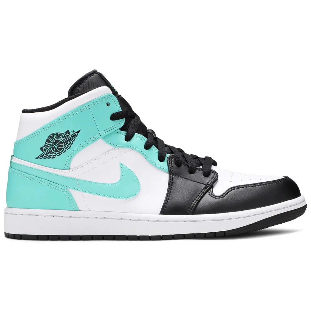 Air Jordan 1 Mid Tropical Twist sneaker with black, white, and turquoise leather accents