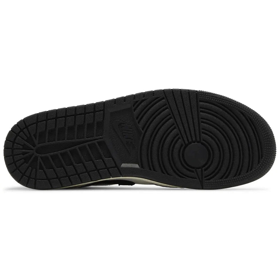 Black rubber outsole of Air Jordan 1 Mid SE Craft Inside Out sneaker, detailed tread pattern