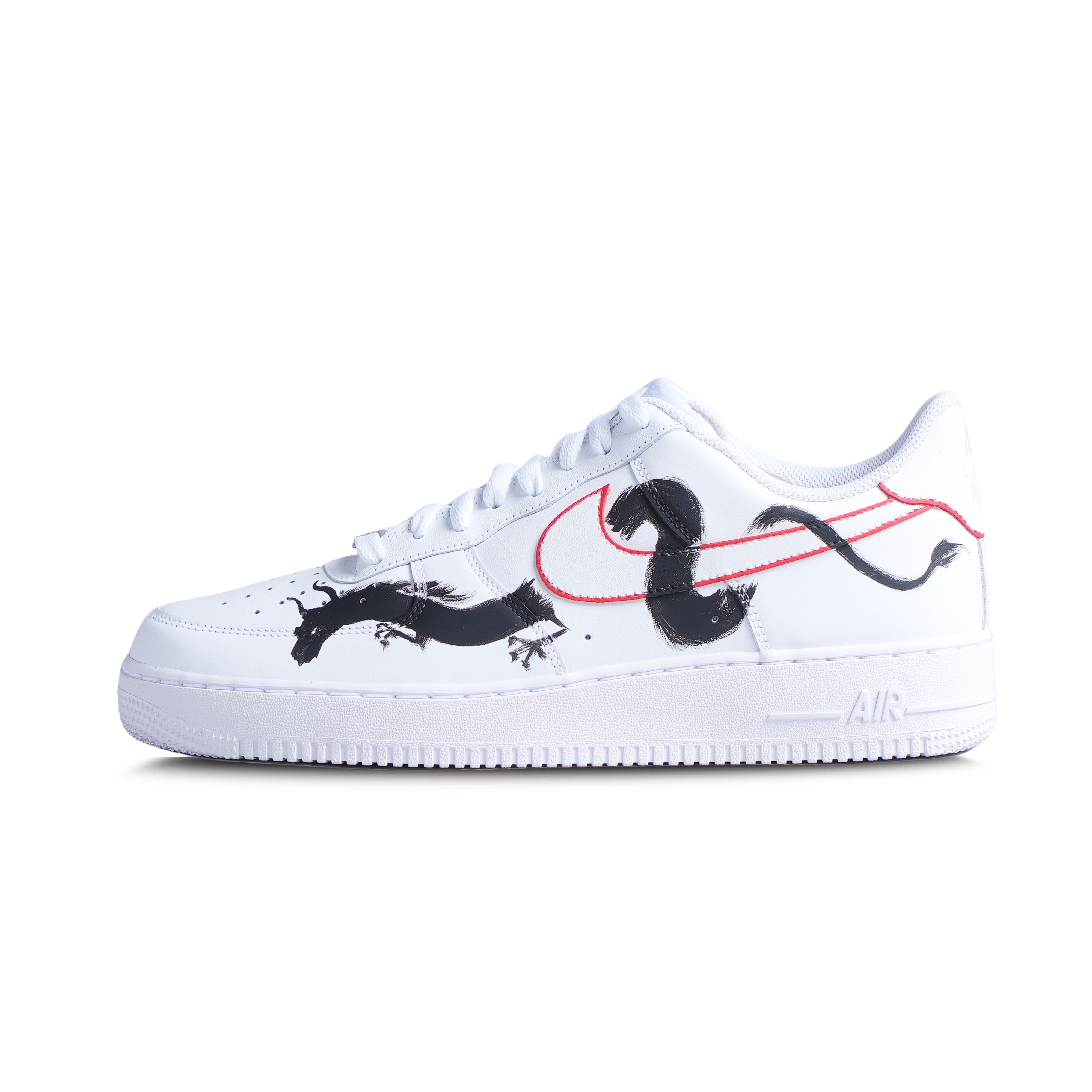 White streetwear sneaker with black dragon graphic and red swoosh outline on side