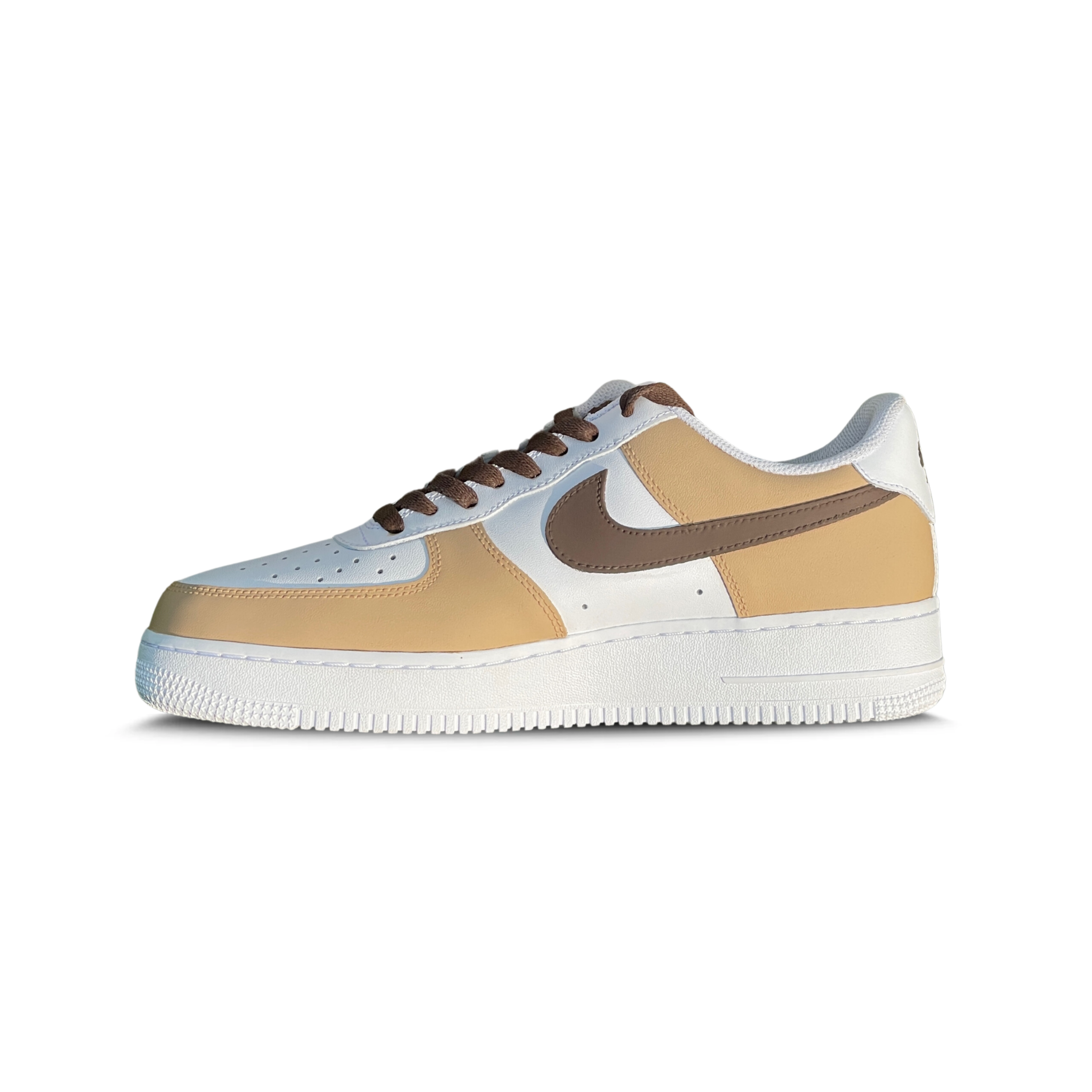 Low-top sneaker with brown, beige, and white color blocking, featuring a brown swoosh logo.