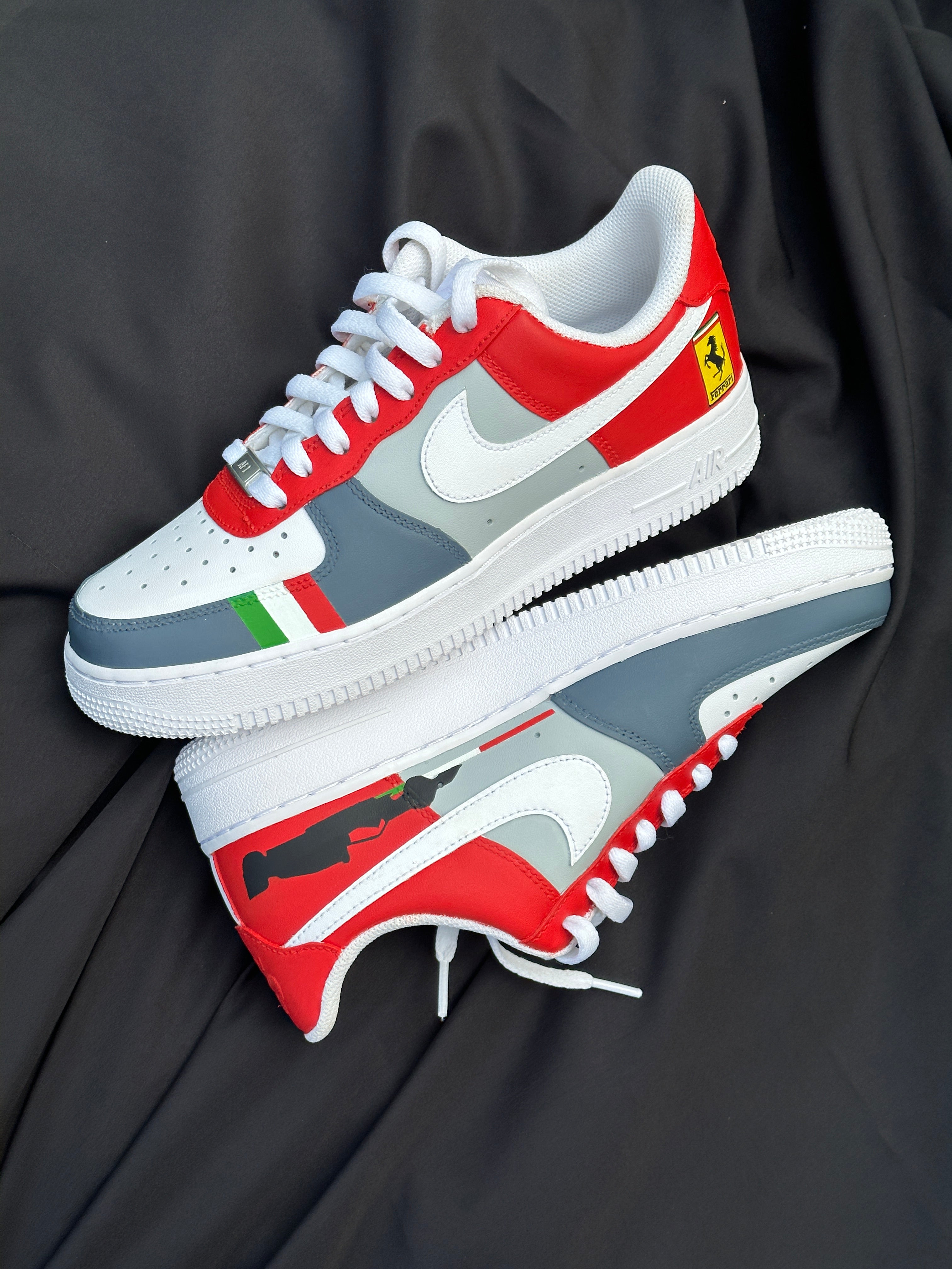 Red, white, and grey custom streetwear sneakers with Ferrari logo and unique side graphics