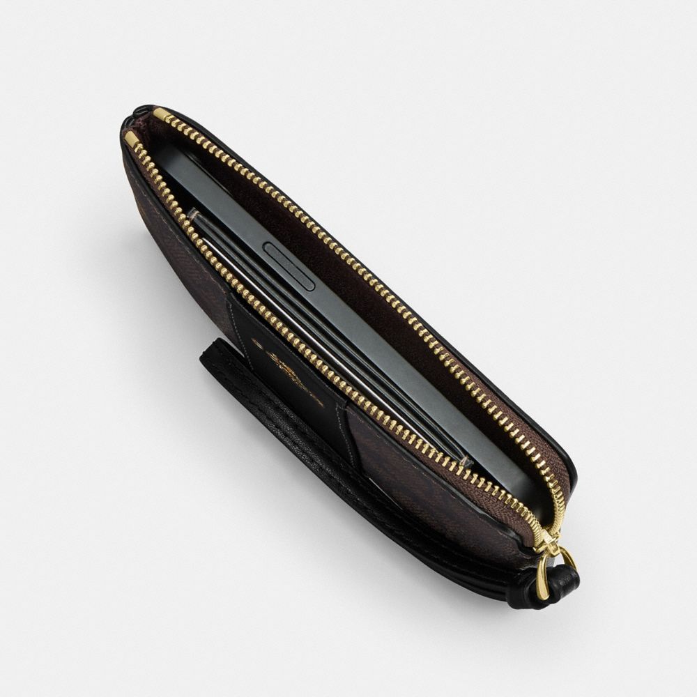 Coach Corner Zip Wristlet In Signature Canvas With Stripe Gold Walnut Black