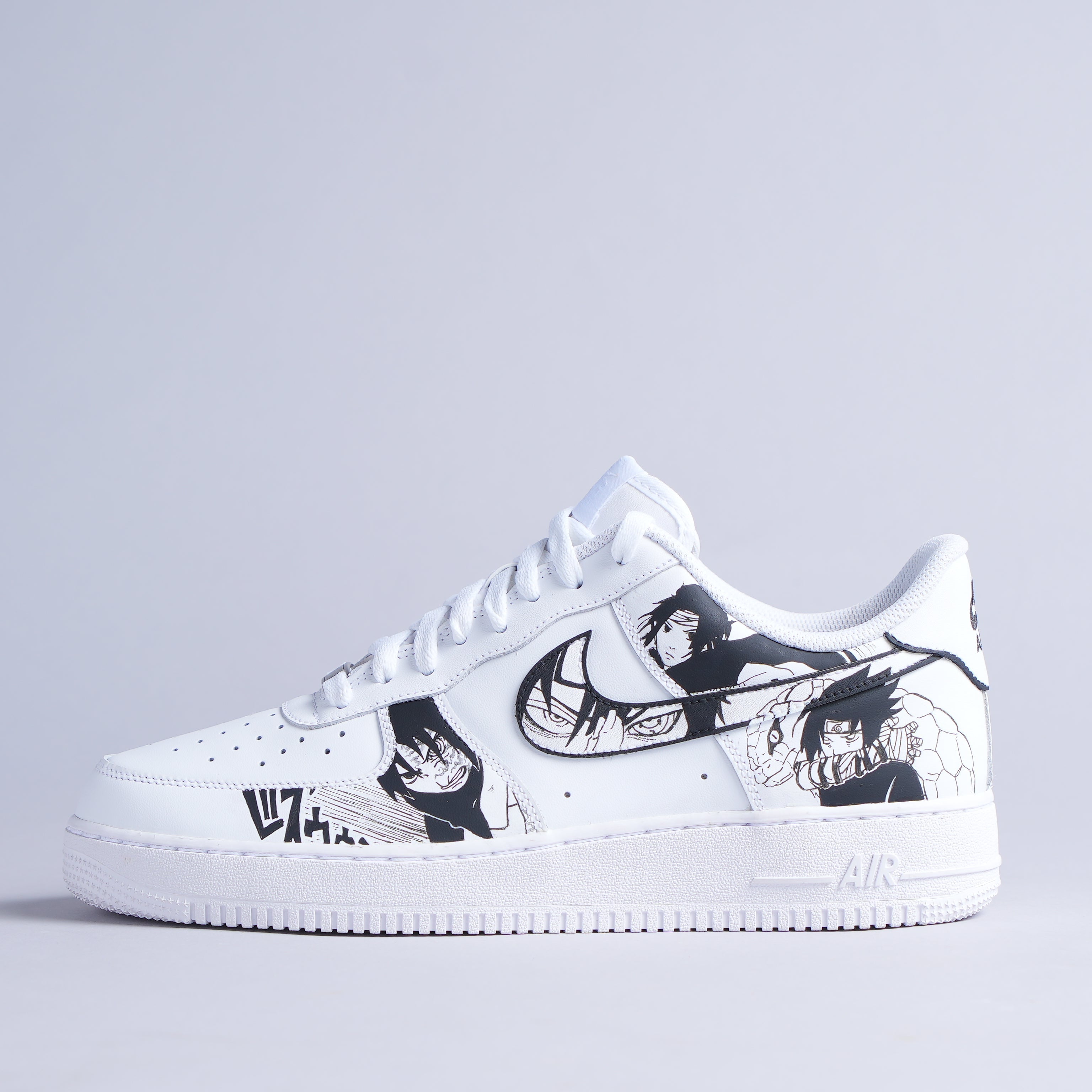 White custom streetwear sneaker with black anime graphics and bold illustration details