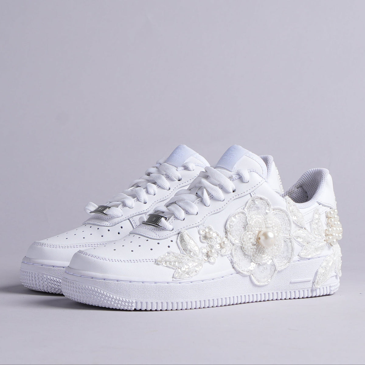 White leather sneakers with pearl and floral appliqué, streetwear designer footwear