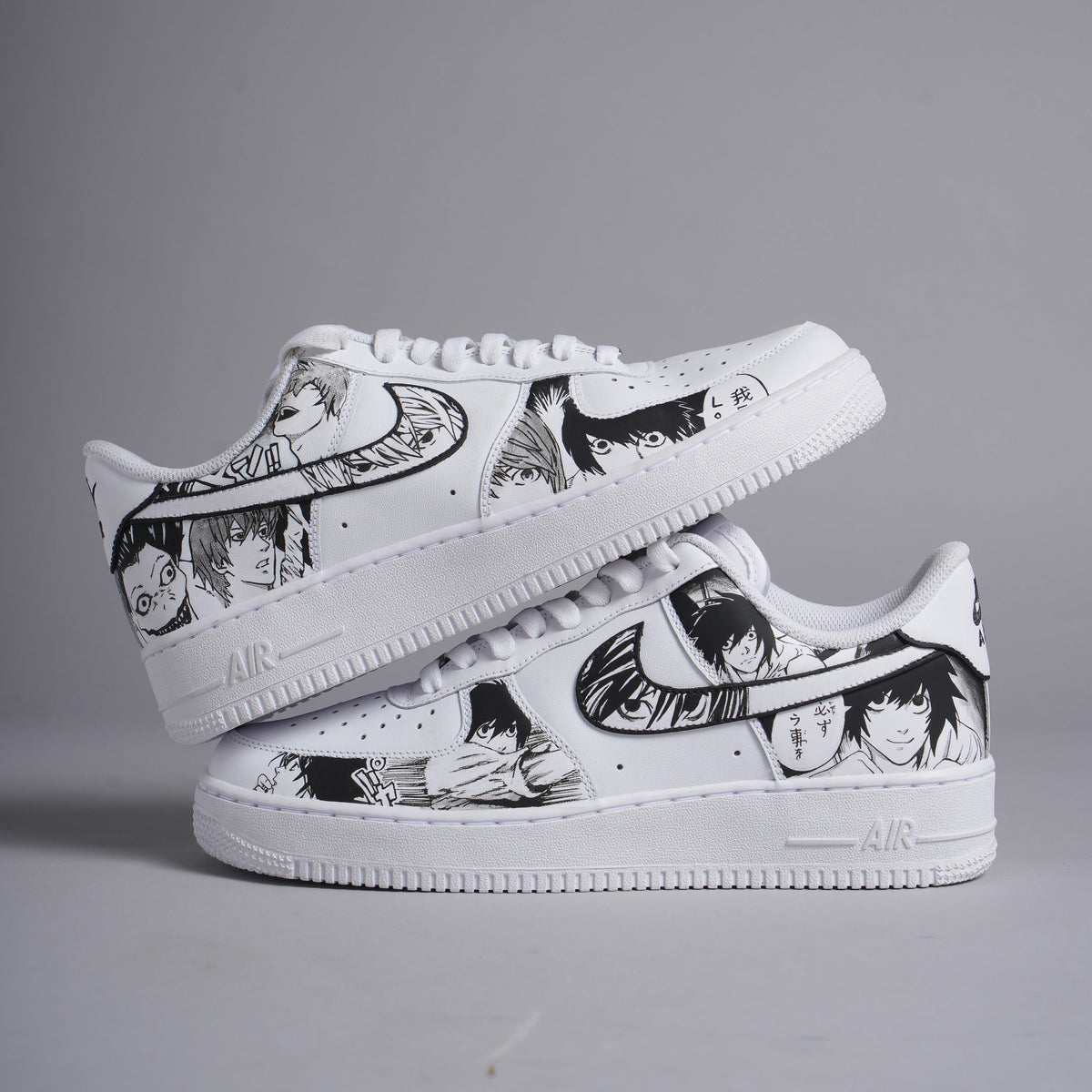 White custom sneakers with black anime character designs, stylish streetwear shoes