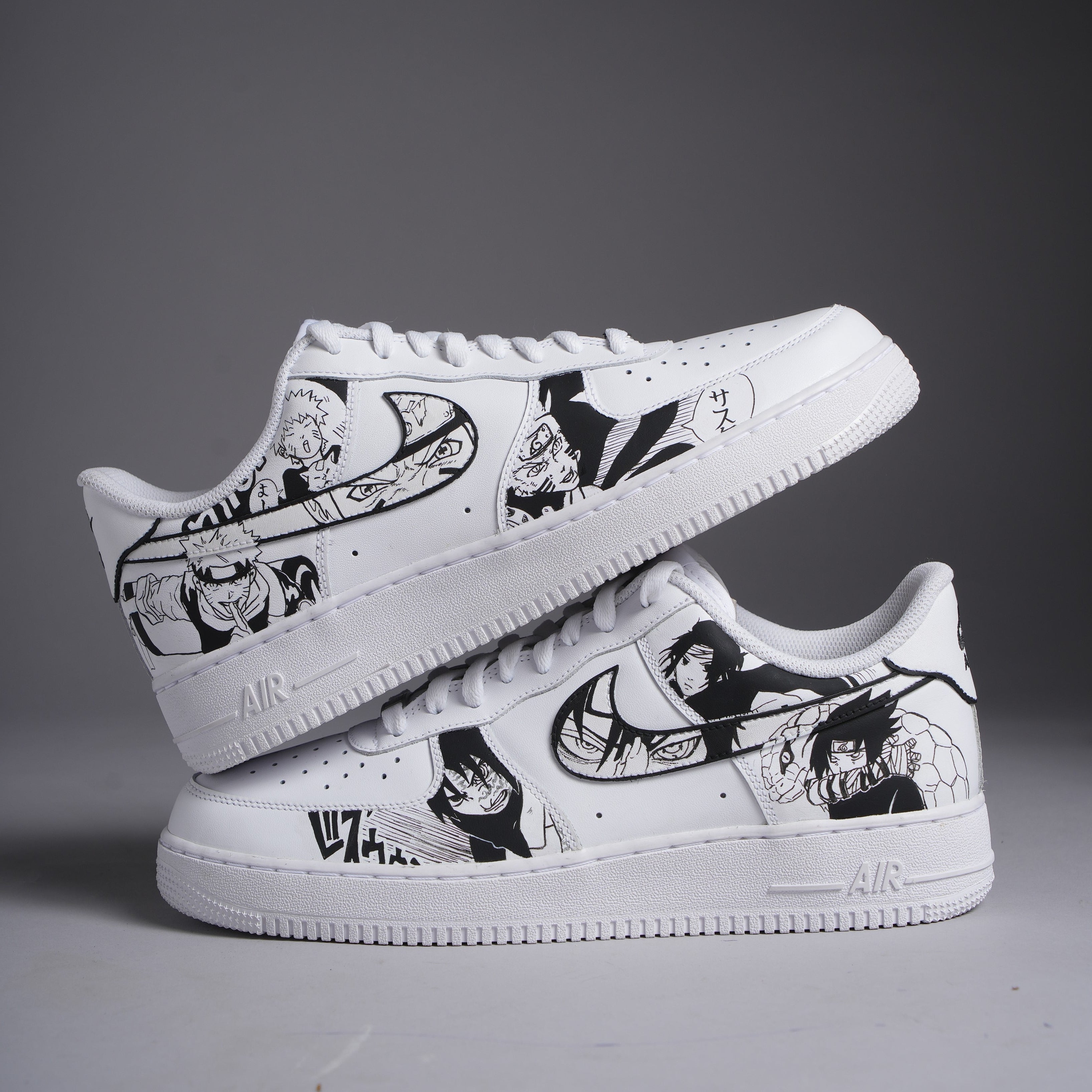 White streetwear sneakers with black anime character designs, limited edition footwear
