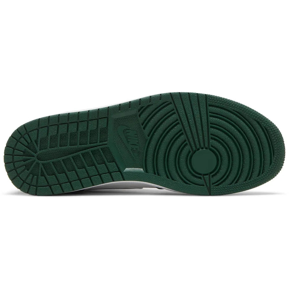 Green rubber sneaker outsole with Nike branding, streetwear shoe bottom view
