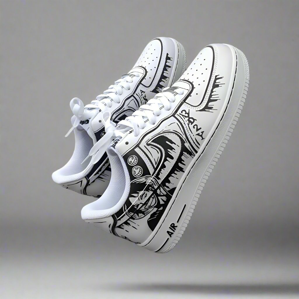 White streetwear sneakers with black graffiti-style designs and custom artwork on sides