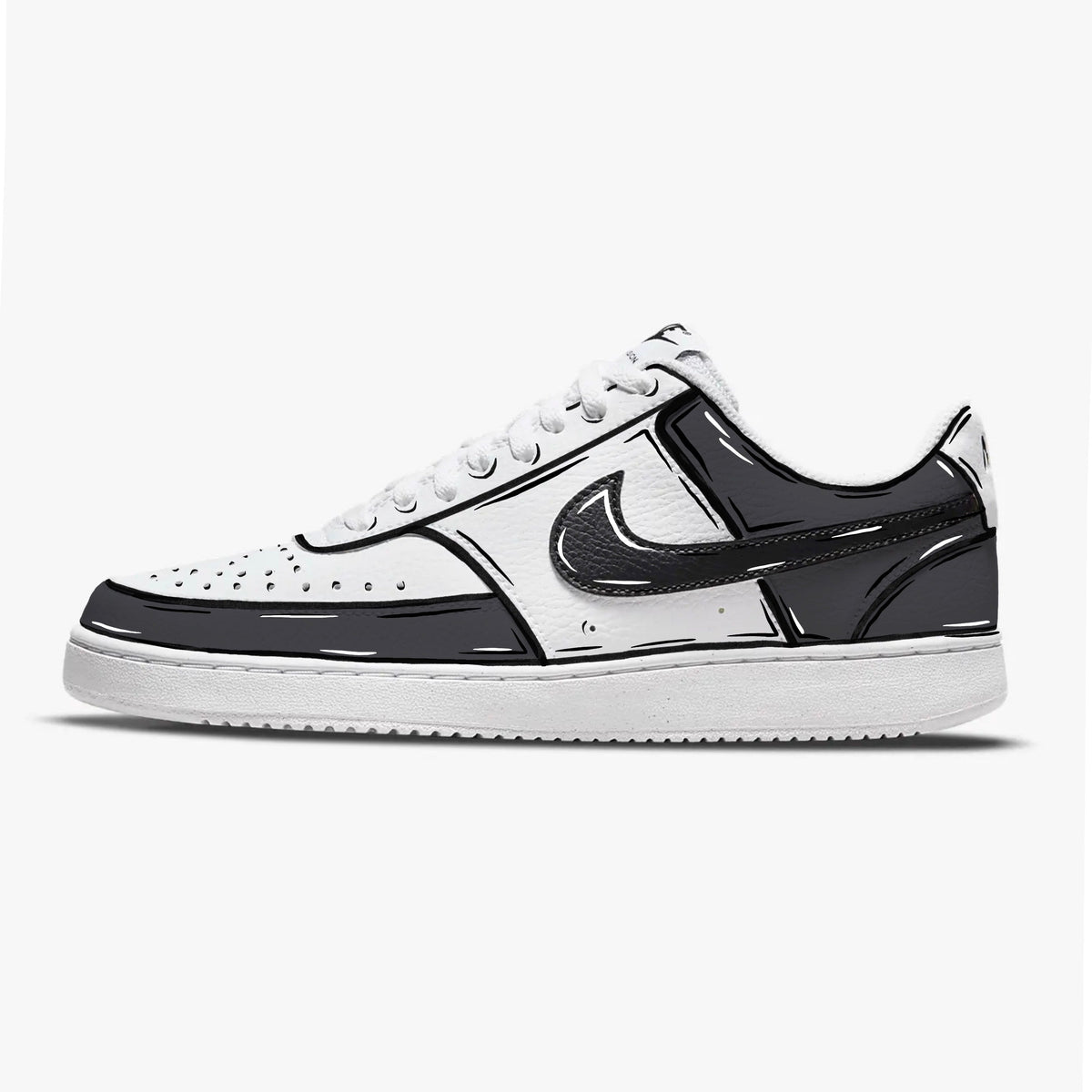 White and black streetwear sneaker with cartoon graphic accents on a clean background