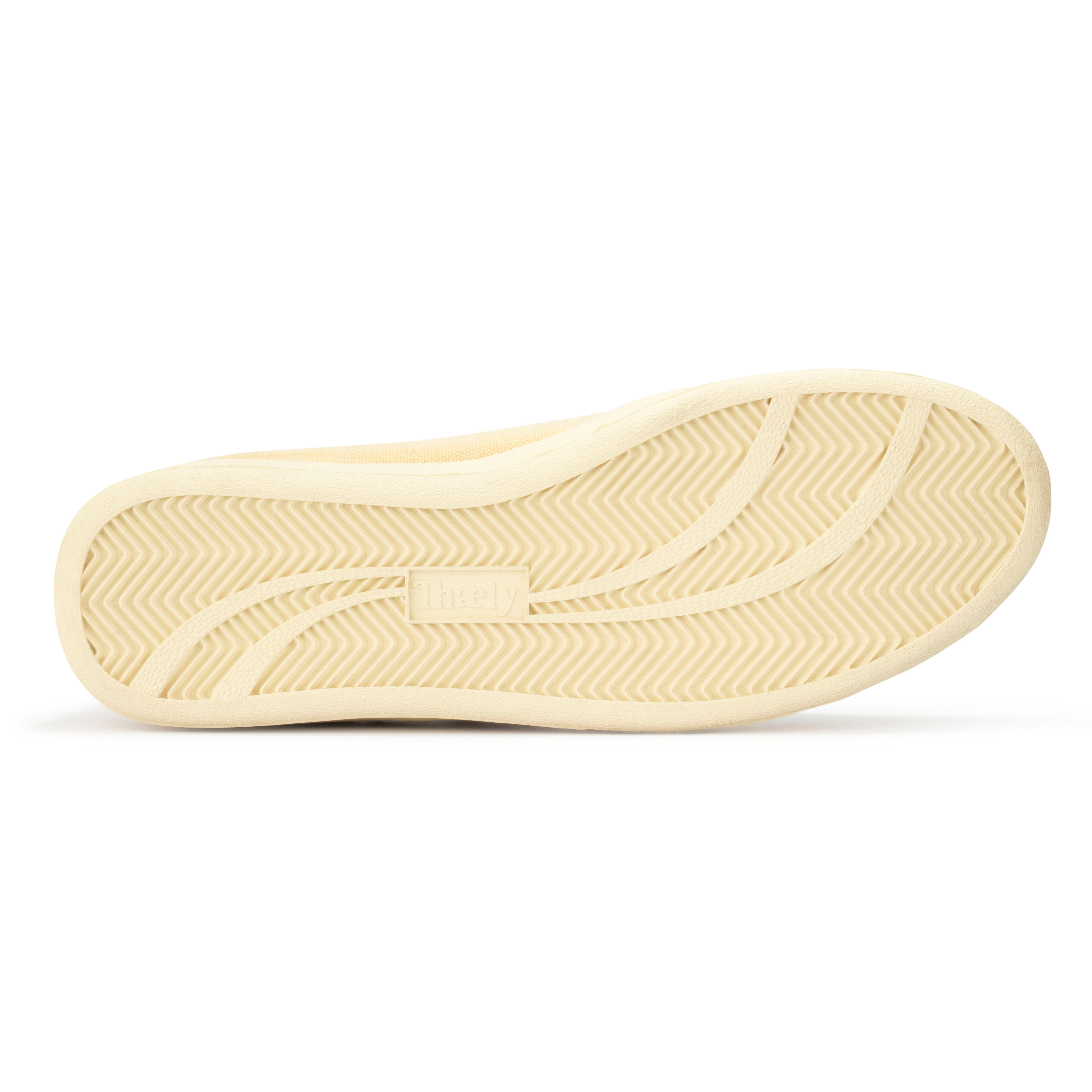 Beige sneaker sole with herringbone grip pattern for streetwear and lifestyle footwear