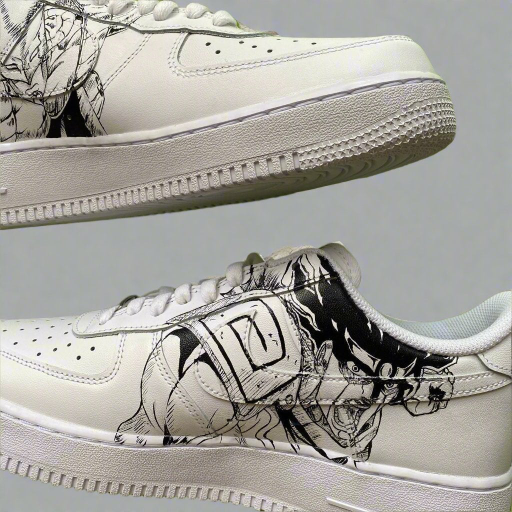 White custom Air Force 1 sneakers with black anime character illustrations on the sides